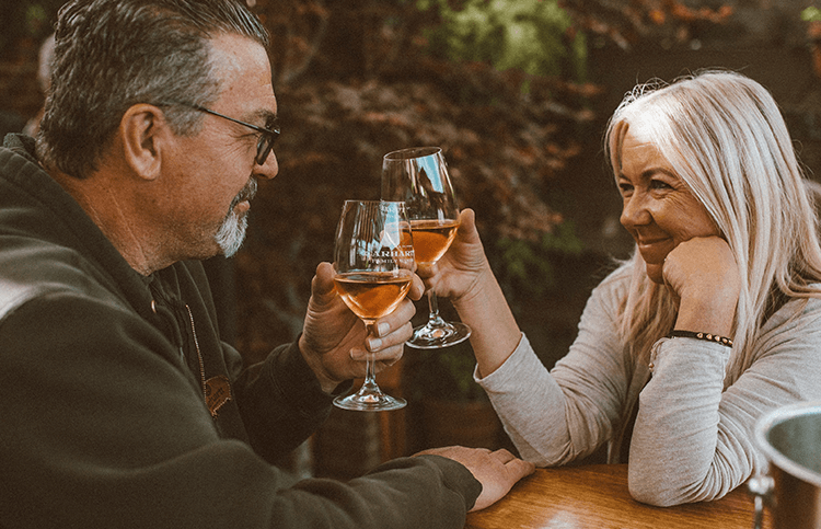 Two People Cheers With Rosè